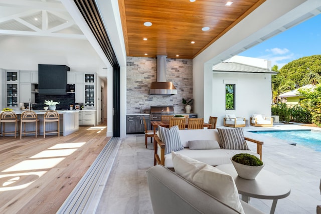 321 NW 7th St, Delray Beach, FL 33444 - view of patio / terrace featuring an outdoor kitchen, an outdoor living space, and an outdoor pool