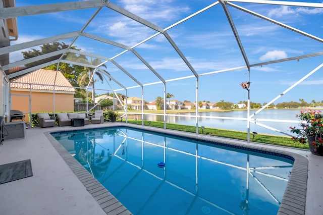 view of swimming pool featuring a water view, an outdoor living space, a lanai, and a patio area