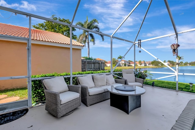 view of patio featuring outdoor lounge area and a lanai