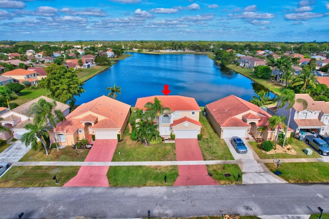 bird's eye view with a water view