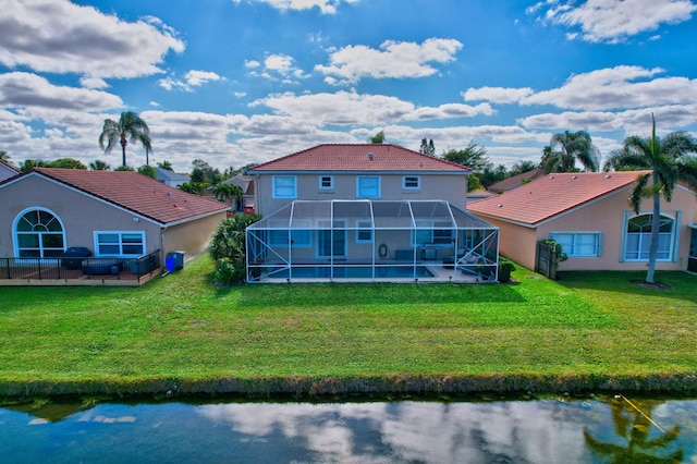 rear view of house featuring an outdoor hangout area, a lanai, a lawn, and a water view