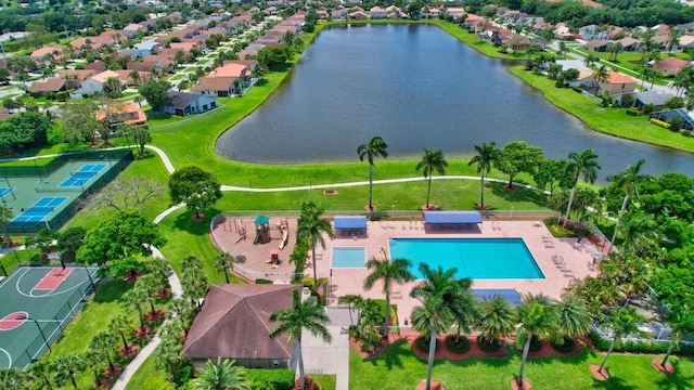 birds eye view of property featuring a water view