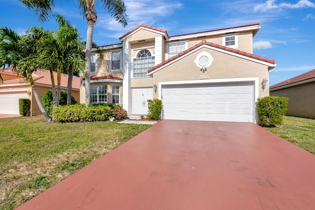 mediterranean / spanish home featuring a garage and a front lawn