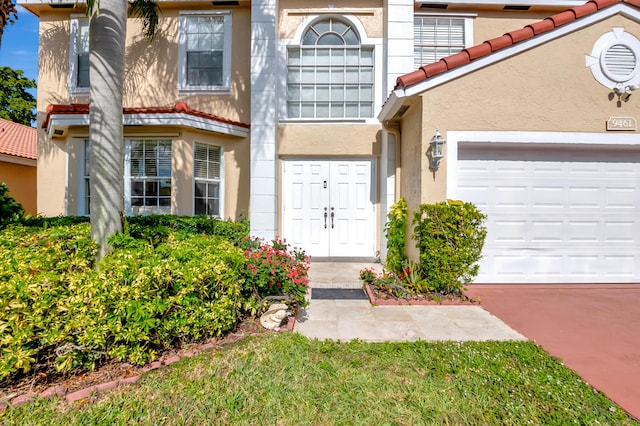 property entrance with a garage