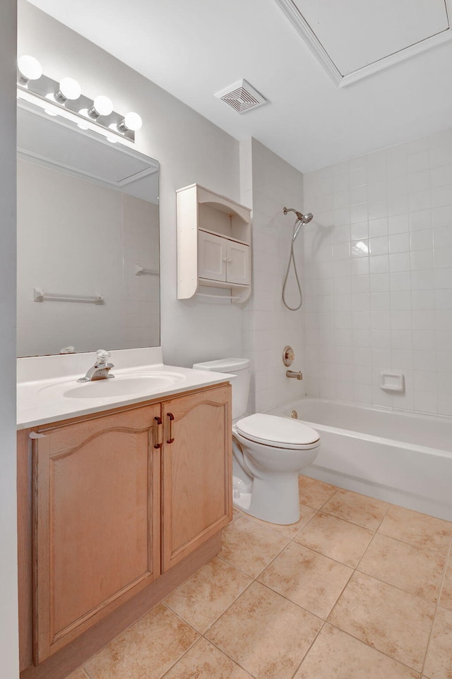 full bathroom with tile patterned flooring, vanity, toilet, and tiled shower / bath combo