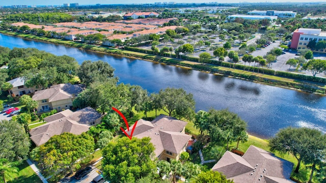 birds eye view of property featuring a water view