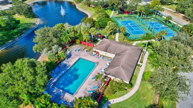 birds eye view of property featuring a water view