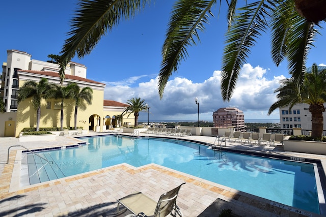 view of swimming pool with a patio