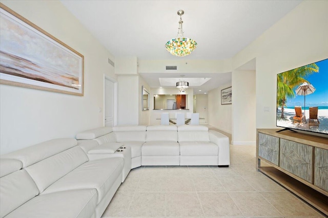 living room with light tile patterned floors