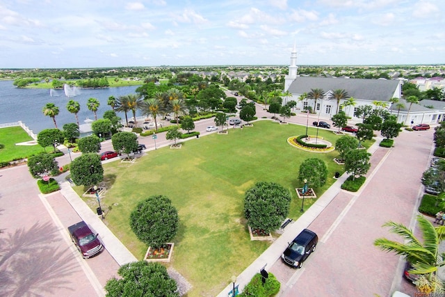 birds eye view of property featuring a water view