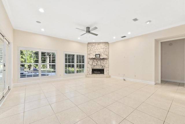 unfurnished living room featuring ceiling fan, light tile patterned floors, and a fireplace