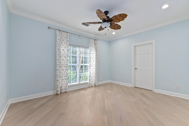 spare room with ceiling fan, light hardwood / wood-style flooring, and ornamental molding