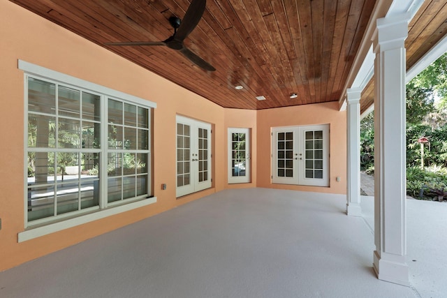 view of patio featuring ceiling fan and french doors