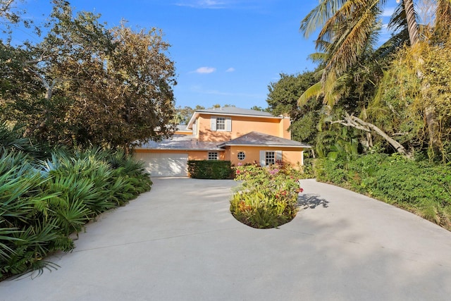 front facade with a garage