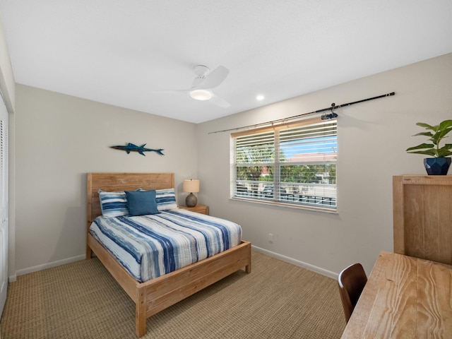 bedroom with carpet flooring and ceiling fan