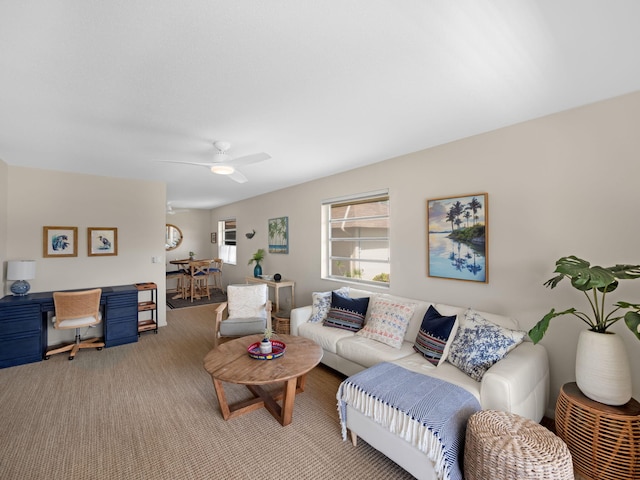 living room with carpet and ceiling fan