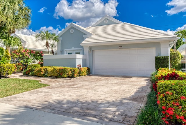 view of front of property with a garage