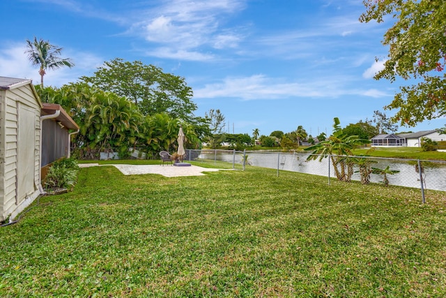 view of yard with a water view