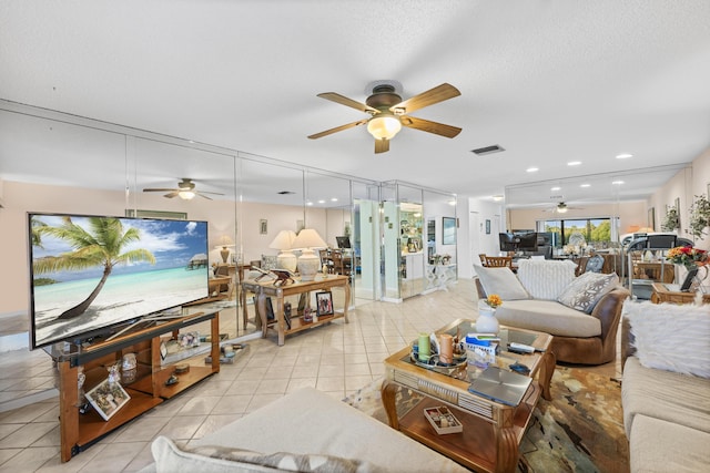 tiled living room with a textured ceiling