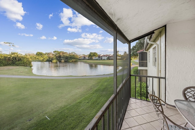 balcony featuring a water view