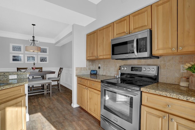 kitchen featuring hanging light fixtures, stainless steel appliances, tasteful backsplash, dark hardwood / wood-style flooring, and light brown cabinetry