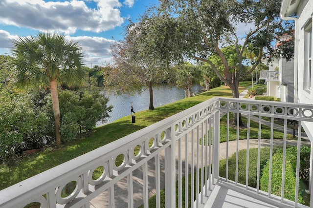 balcony featuring a water view