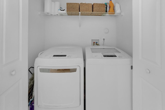 laundry room featuring independent washer and dryer