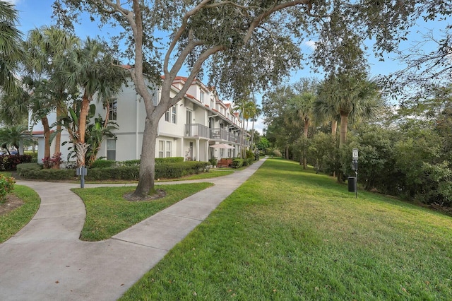 view of community featuring a yard