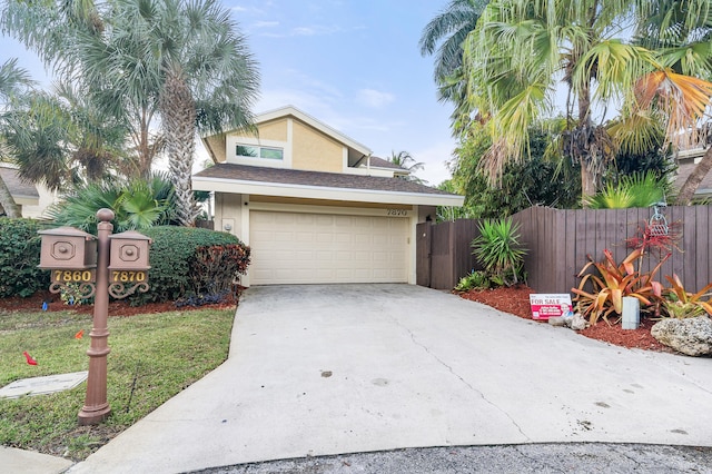 view of front of home with a garage