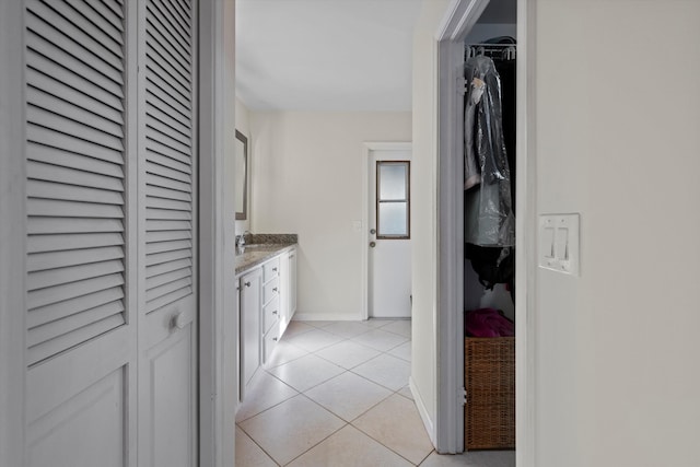 bathroom with vanity and tile patterned floors