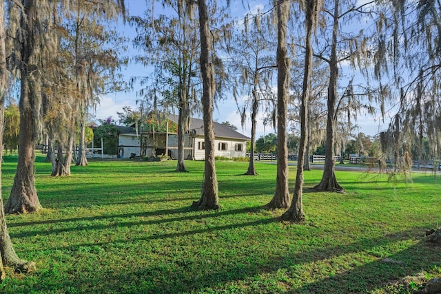 surrounding community with a lawn