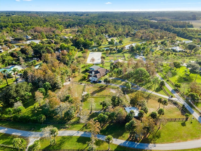 aerial view with a rural view and a water view