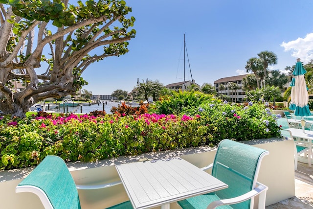 view of patio / terrace with a water view