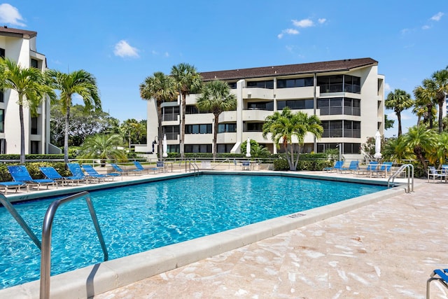 view of pool featuring a patio area