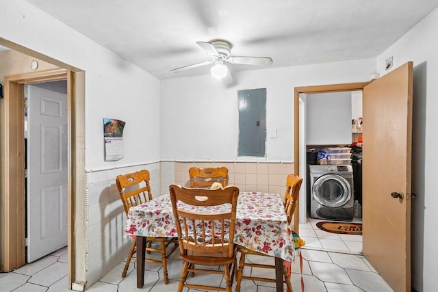 232 SW 6th Ave, Boynton Beach, FL 33435 - dining area with washer / dryer, electric panel, a wainscoted wall, a ceiling fan, and light tile patterned floors