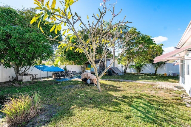 232 SW 6th Ave, Boynton Beach, FL 33435 - fenced backyard featuring a patio