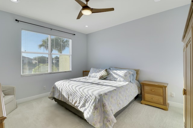 bedroom with light carpet, baseboards, a ceiling fan, and recessed lighting