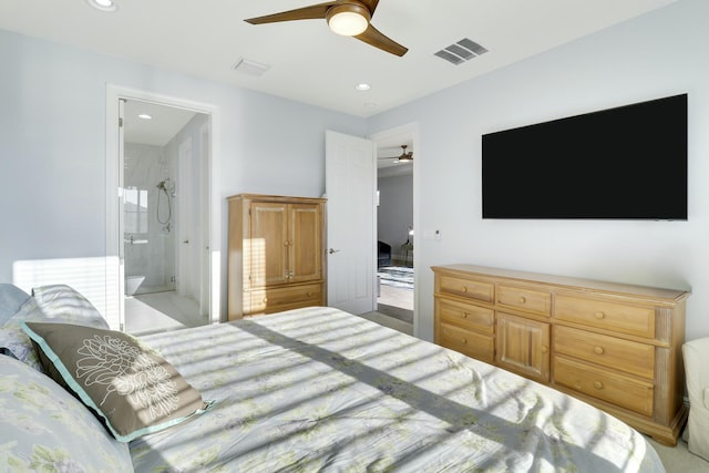 bedroom featuring ensuite bathroom and ceiling fan