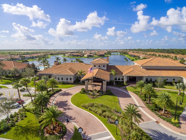 birds eye view of property featuring a water view