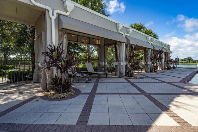 view of patio / terrace with a water view