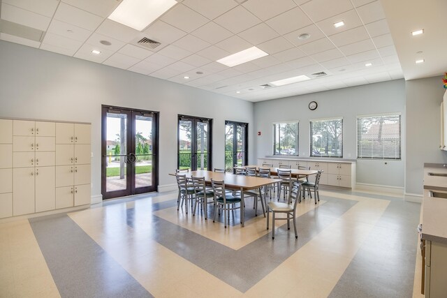 playroom with french doors, light colored carpet, a raised ceiling, crown molding, and pool table