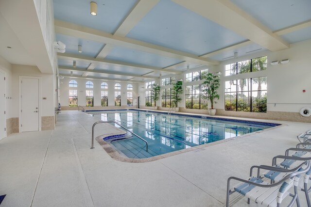 view of swimming pool featuring a patio area