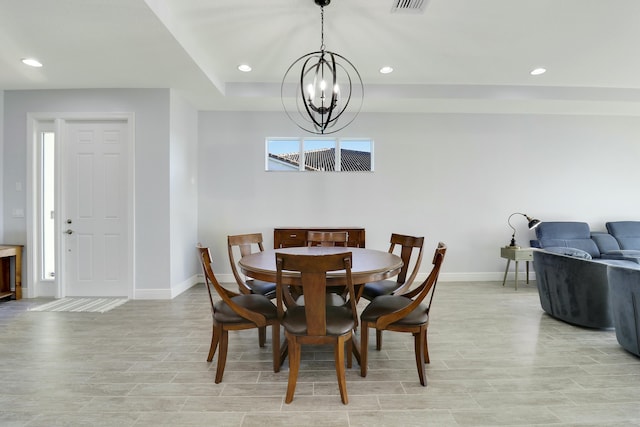 dining area featuring light wood-type flooring, baseboards, and recessed lighting