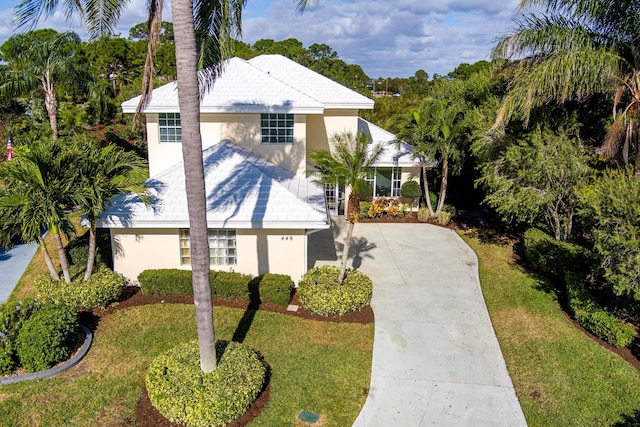 view of front of property with a front lawn