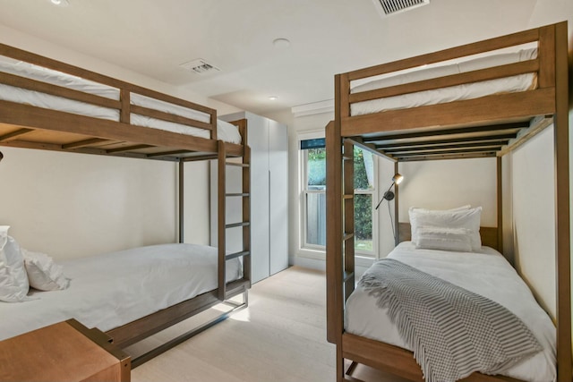 bedroom with light hardwood / wood-style floors