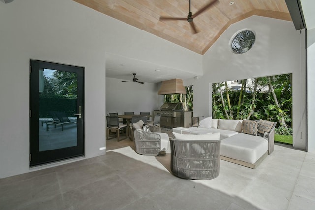 view of patio / terrace featuring area for grilling, ceiling fan, and an outdoor hangout area