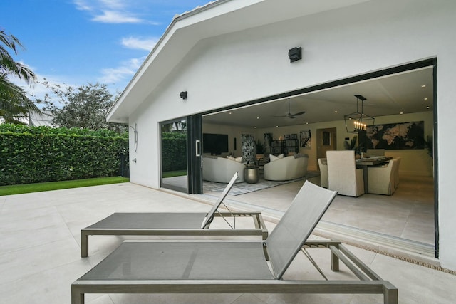 view of patio with ceiling fan