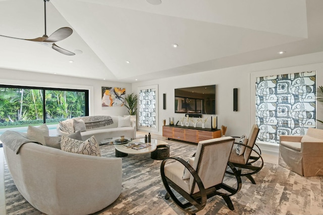 living room featuring high vaulted ceiling and ceiling fan