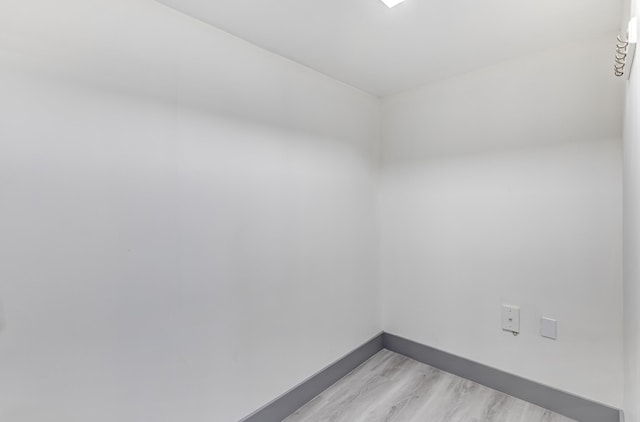 unfurnished room featuring light hardwood / wood-style flooring