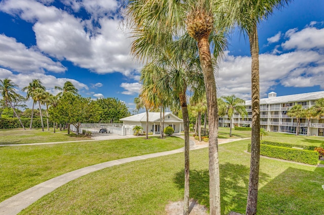 view of community featuring a lawn